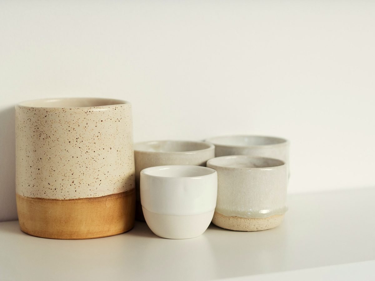 Textural ceramic vessels in chalky cream and sand glazes